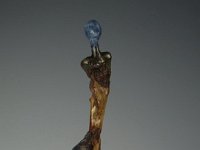 For Henry  I have had a very high regard of and admiration for the work of British sculptor Henry Moore since first coming across his work over fifty years ago. From June of 2010 until January 2011 a selection of his works were exhibited at the Denver Botanic Gardens and, needless to say, I visited the exhibit many times during its stay.  I made this piece after the show's closing with no concious thought about the works I had recently immersed myself in.  On completion it was plain to see that the piece bore more than a passing resemblance to some of Henry Moore's figurative works and as such I could not let the time when I had been unknowingly influenced to such an extent as to produce an homage to one of my most favourite artists pass.  Hence the title. 20 x 3.5 x 1.5 inches   $1100.00